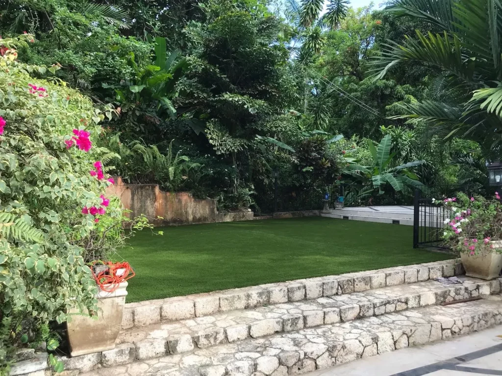 Residential artificial turf offers a year-round, lush green background for your home.
